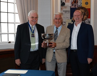 Chris Symonds receiving the Devonshire Bowl from Alan Holyoake and the President, Mike Roberts